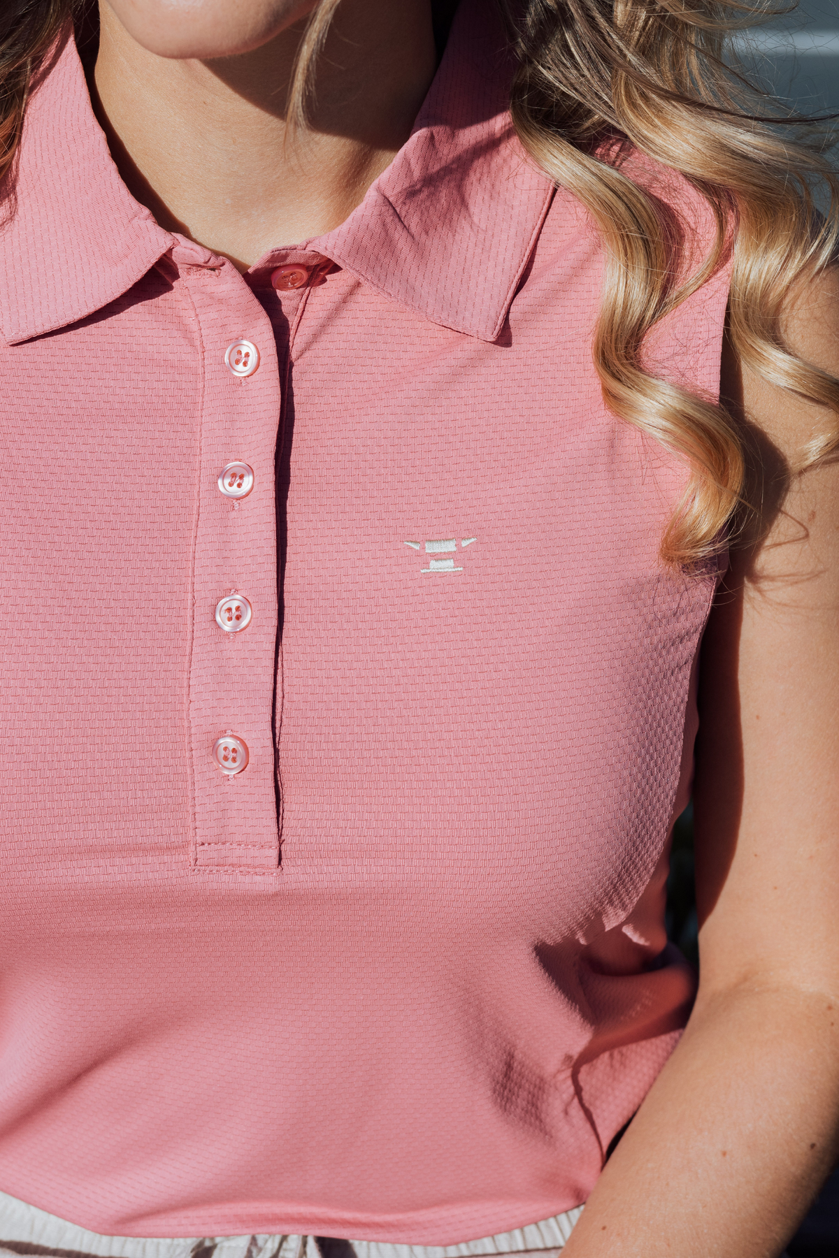 Sleeveless Performance Polo – Powder