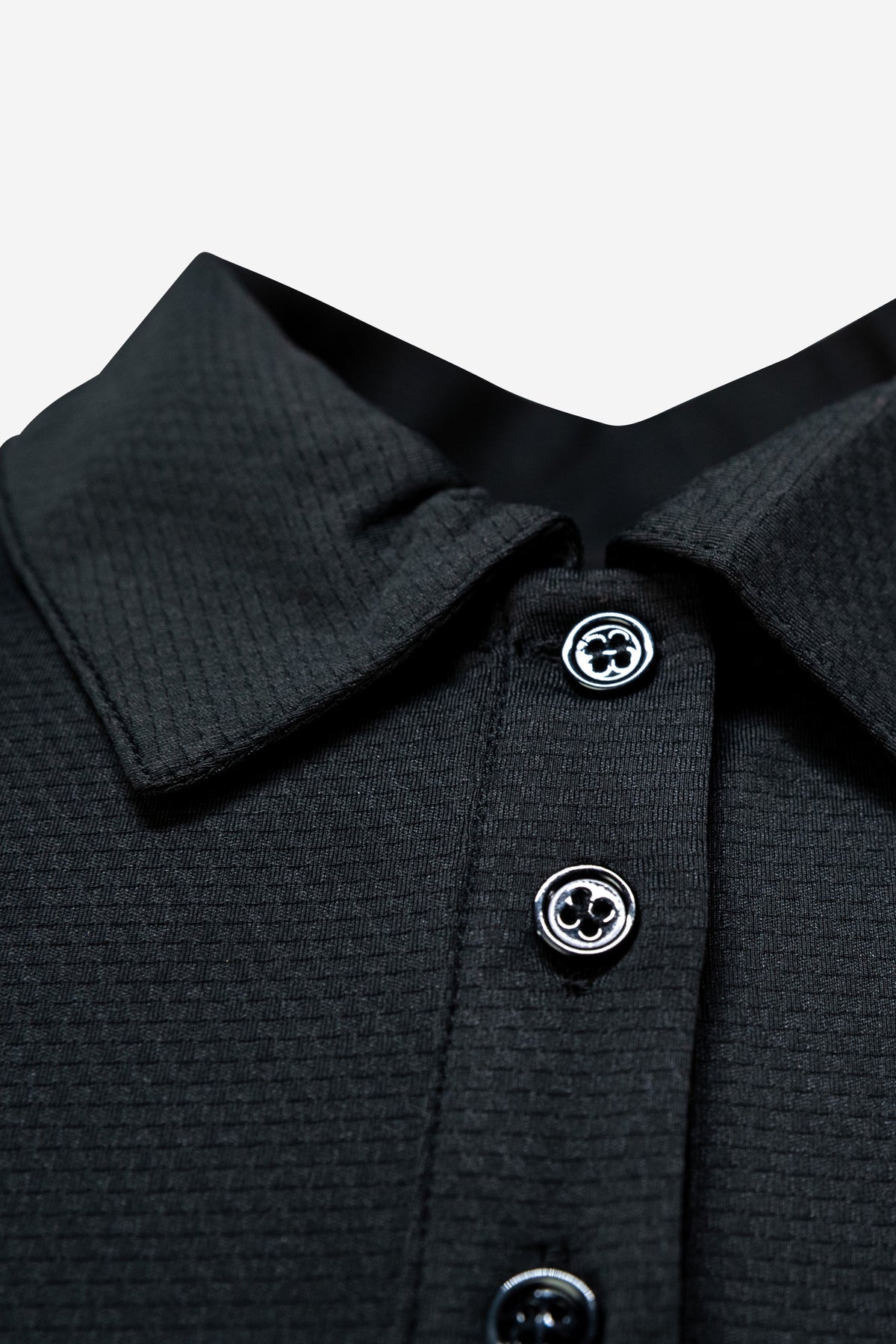 Sleeveless Performance Polo – Schwarz