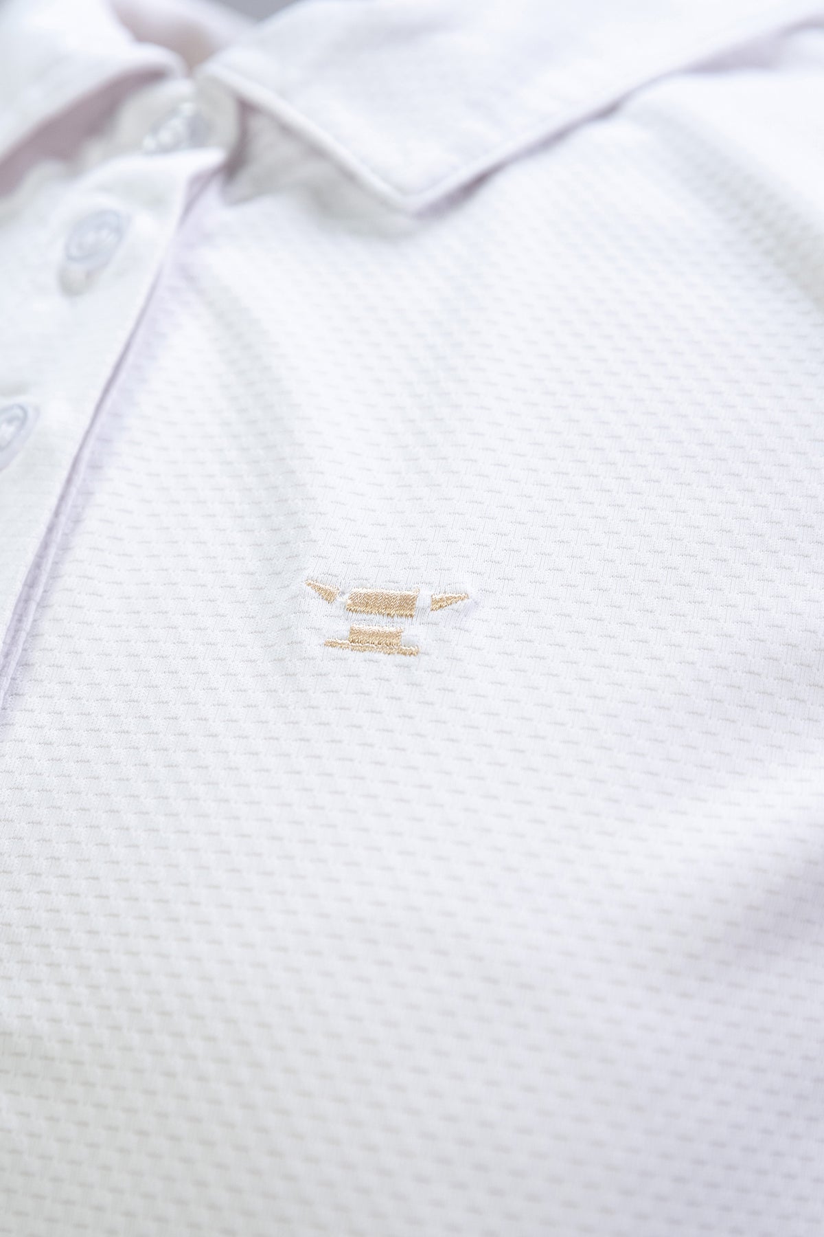 Sleeveless Performance Polo – Weiss