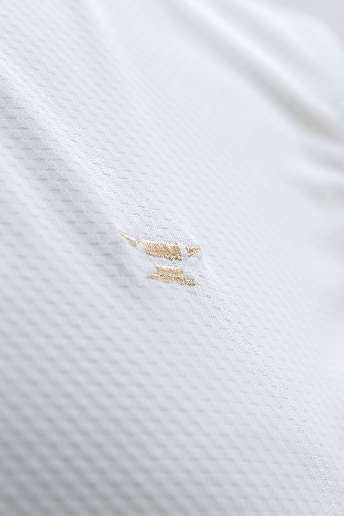 Sleeveless Performance Polo – Weiss